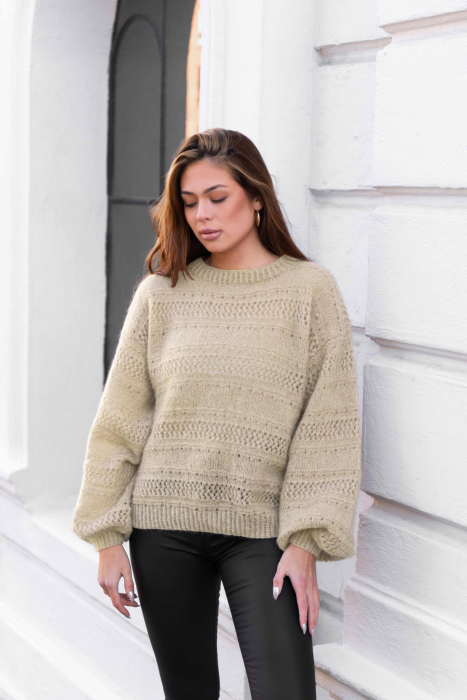 Andrine Genser Sand Melert av SD 